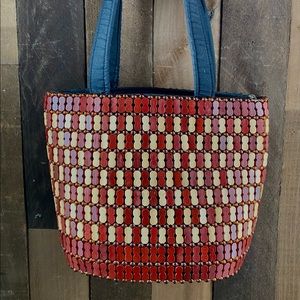 Hand made wooden beaded shoulder bag. Make in Kenya by the Rafiki Foundation